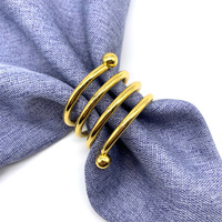 Anneaux de serviette en forme de spirale dorée pour les anneaux de porte-serviettes en métal de fête de mariage
