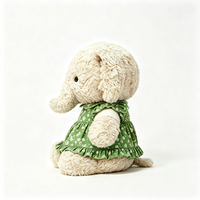 Vente en gros d'éléphant en peluche doux et bouclé, vêtu d'une robe verte à fleurs, design personnalisé, mascotte, cadeau, jouet en peluche
