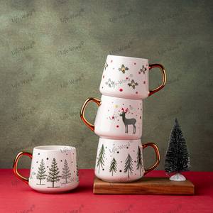 ชุดแก้วเซรามิกที่มีธีมเทศกาลคริสต์มาสชุดภาชนะสำหรับดื่มขอบทองสีขาวพร้อมรูปต้นสนรูปกวางสำหรับงานเลี้ยงถ้วยชากาแฟ - Product Image 5