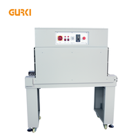 Machine de thermoformage à tunnel électrique OEM personnalisée GURKI pour aliments, boissons, produits chimiques, film POF, automatique, 1-40 pièces/min, garantie 1 an