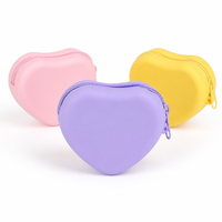 Pochette de rangement portable en silicone en forme de cœur, avec fermeture éclair, pour câbles, cosmétiques et articles essentiels quotidiens