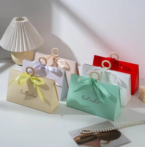 Custom Logo Eco‑friendly Triangular Paper Gift Bags Bulk Wholesale Wooden <b>Ring</b> Carry Handle And Satin Ribbon Bow Sustainable Pac - Product Image 1