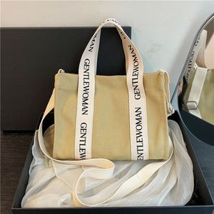 Bolso de Hombro Casual de Moda Urbana, Correa Única, Lona, Cierre de Cremallera, Tamaño Mediano, con Letras, para Uso Diario - Product Image 2