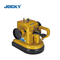 Machine à coudre industrielle JOCKY JK2610-4 pour fourrures, cuir et travaux lourds, destinée à l'industrie du vêtement.