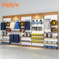 Étagère murale de présentation sur mesure pour boutique, support noir pour vêtements, magasin de vente au détail de vêtements