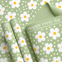 Papier d'emballage en gros motif marguerite avec citation inspirante « Happy Every Day » – Emballage floral à pois pour bouquets et cadeaux