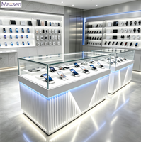 Table de présentation de téléphone portable Maxsen, en verre, avec éclairage LED ambiant, affichage numérique gris et blanc, robuste et écologique, pour usage commercial