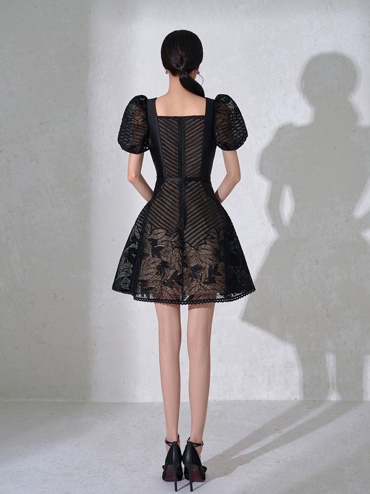 Shop Our Elegant Black Short-Sleeve Dress with Ruched Details