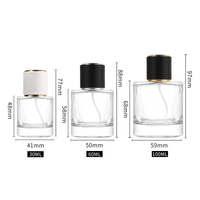 Botol parfum kaca mewah 60ml 100ml botol semprot kaca bulat kosong dengan pompa tutup botol parfum kaca kustom