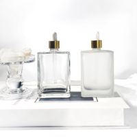 Flacons d'huile essentielle rectangulaires de luxe, flacon d'huile corporelle 30ml 50ml 100ml, flacon compte-gouttes en verre, flacon de crème pour les yeux, emballage cosmétique