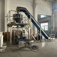 Machine d'emballage automatique de bonbons au chocolat et de noix, système de scellage à l'azote, machine d'emballage VFFS pour la conservation de la fraîcheur
