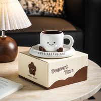 Mug à café en céramique mignon avec soucoupe, motif adorable visage souriant et pied, idéal pour la maison, le bureau ou comme cadeau