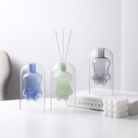 Diffuseur d'arômes artisanal double paroi en verre borosilicate coloré, forme patte de chat, pour printemps, été, automne, écologique et durable