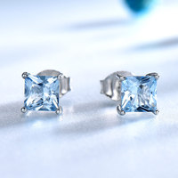 Tren mode baru tipe geometris S925 perak bertatahkan biru safir 5A zircon desain niche anting-anting bunga