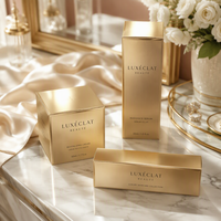 Boîte d'emballage cosmétique sur mesure de haute qualité pour flacons d'huiles essentielles et de parfums, légère, avec impression dorée.