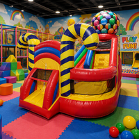 Château gonflable sur le thème des bonbons, château gonflable coloré en forme de macaron avec toboggan pour la location de fêtes d'enfants