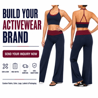 Ensembles de yoga personnalisés pour femmes, deux pièces, couleur unie, respirants, avec soutien-gorge de sport contrastant et pantalon large, vêtements de sport pour la gym