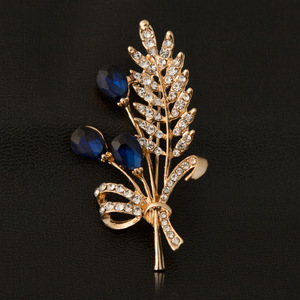 Grande broche en forme de nœud doré avec cristaux couleur épis de blé, pour corsage, pour fabricants de vêtements - Product Image 1
