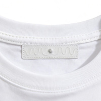 Étiquette RFID UHF lavable 860-960 MHz longue portée pour le suivi des textiles, du linge et des vêtements