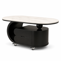 Table basse ovale moderne en marbre avec tiroirs de rangement et roulettes pour salon