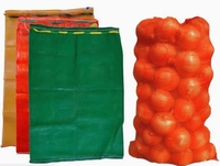 Machine automatique de découpe et de couture pour la production de sacs en filet et de sacs Leno, et machine de fabrication