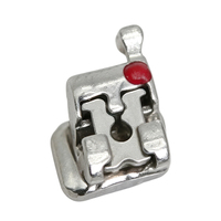 Brackets orthodontiques dentaires en alliage métallique, conception à fente de précision, surface lisse, kit en boîte, zonage des positions dentaires, orthodontie