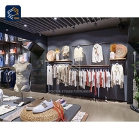 Dernière conception de rayonnages gondoles en matériaux recyclés pour magasins de vêtements – Fournisseur de solutions de vente au détail