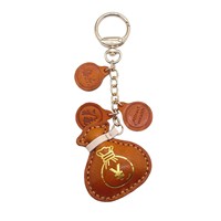 Pochette porte-bonheur best-seller en cuir véritable, pendentif fait main, porte-clés décoratif simple, accessoire de sac au design mignon, nouvelle tendance