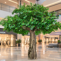Grand arbre artificiel Banyan avec racines aériennes, feuillage luxuriant et réaliste, personnalisable pour la décoration intérieure des centres commerciaux, hôtels et restaurants