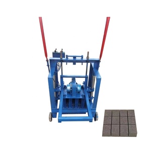 QT2-45 penggunaan di rumah Manual kecil konstruksi rumah tanah liat padat berongga mesin pembuat bata di palet Nigeria kepala Ram - Product Image 2