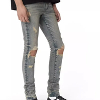Fabricant sur mesure de jeans en denim pour hommes, taille haute, délavé clair, coupe crayon, effet usé et déchiré, imprimé automne, OEM ODM
