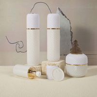 Paquets cosmétiques en verre personnalisés de 40ml 100ml 120ml de bonne qualité flacons à pompe de sérum de lotion blanc à rayures avec pot de crème de 100g