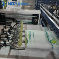 Machine de fabrication de sacs en non-tissé entièrement automatique à découpe en W, contrôlée par PLC, entraînée par moteur et moteur électrique, haute vitesse, pour sacs T-shirt et sacs de courses réutilisables