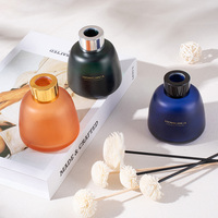 Vente en gros de flacons ronds en verre ambré foncé de 100 ml avec bouchons et bâtonnets applicateurs d'aromathérapie pour huiles essentielles