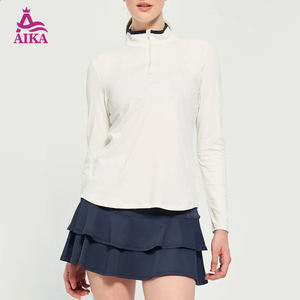 Özel Logolu Tenis Kıyafeti Antrenman 1/4 Fermuarlı Uzun Kollu Gömlek Etekli Şort 2 Parça Set Golf Tenis Eteği Kadınlar İçin - Product Image 1