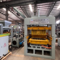 Machine à blocs de béton vibratoire QT4-15 pour la production de briques creuses et pleines