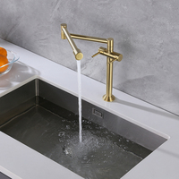 Robinet de cuisine moderne de luxe avec double poignée dorée Robinets de remplissage de casseroles pliants flexibles Robinet d'eau en céramique pour évier de cuisine