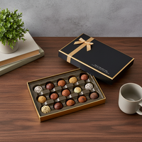 Boîte cadeau de luxe pour chocolats, 15 cavités, avec logo personnalisé, en carton rigide noir et or, pour truffes et confiseries, avec ruban et nœud.
