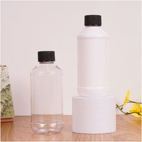 Vente en gros de flacons en plastique blanc pour médicaments liquides PET de 250 ml et 500 ml, contenants vides pour sirop contre la toux avec bouchon inviolable et pulvérisateur