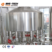Machine de remplissage automatique de jus de fruits en bouteilles de verre BVE haute précision 200 ml, contrôlée par PLC, électrique et pneumatique, 7000-80000