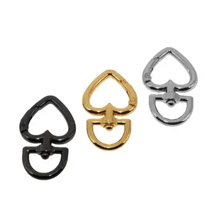 Modische metallische herzförmige D-Schwanz-Schlüsselanhänger feder drehender Haken Spielzeug Kleidung Tasche Zubehör