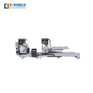 Máquina <span class=keywords><strong>de</strong></span> corte <span class=keywords><strong>de</strong></span> doble cabezal CNC para perfiles <span class=keywords><strong>de</strong></span> <span class=keywords><strong>aluminio</strong></span> con motor, controlada por PLC, para la fabricación automática <span class=keywords><strong>de</strong></span> ventanas <span class=keywords><strong>y</strong></span> puertas <span class=keywords><strong>de</strong></span> <span class=keywords><strong>aluminio</strong></span>, PVC <span class=keywords><strong>y</strong></span> UPVC. - Product Image 1