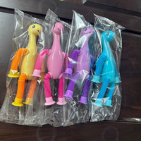 Jouet de soulagement du stress en plastique à ventouse, tube télescopique polyvalent, dinosaure de dessin animé, nouveauté