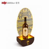 Support de bouteille LED TERMEIN en acrylique noir mat, présentoir à vin et spiritueux avec dos miroir