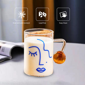 Tasse en verre moderne et élégante avec motif <span class=keywords><strong>de</strong></span> <span class=keywords><strong>visage</strong></span> <span class=keywords><strong>de</strong></span> dame et poignée en forme <span class=keywords><strong>de</strong></span> boule Verres à café et lait transparents avec impression <span class=keywords><strong>de</strong></span> demi-<span class=keywords><strong>visage</strong></span> - Product Image 1