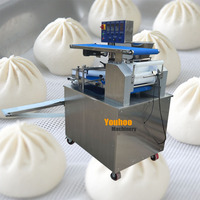 Machine à brioches à viande de porc juteuse entièrement automatique à la main machine à fabriquer des petits pains au pau momo faisant la machine à boulettes
