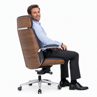 Chaise de bureau exécutive ergonomique pivotante en cuir synthétique PU noir avec appui-tête haut, vente en gros d'usine