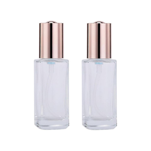 Flacon de parfum vide de luxe OEM 50 ml en verre épais transparent à fond plat avec capuchon argenté mat, pulvérisateur à pompe et logo personnalisé par sérigraphie - Product Image 1