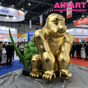 Estatua Inflable de Gorila Gigante Metálico Dorado Personalizada, Modelo Inflable de King Kong Dorado Brillante con Hojas Verdes de Selva - Product Image 1
