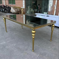 Table dorée avec dessus en verre miroir de luxe, Table ronde à deux nids en acier inoxydable pour événement, pour mariage